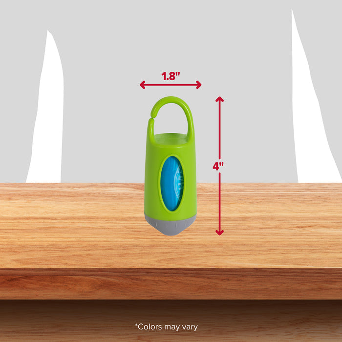 A compact green Arm & Hammer Dispenser with a top handle sits on a wooden surface. At 1.8 inches wide and 4 inches high, its ideal for storing dog waste bags with odor control. The text Colors may vary appears at the bottom.