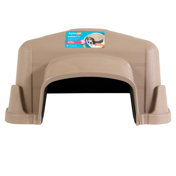 The Aspen Pet Petbarn 3 Dog House by Aspen Pet is a tan igloo-shaped shelter made from durable plastic, featuring a small arched entrance and raised floor. It combines style and function with a top label displaying a dog image, perfect for your pet.