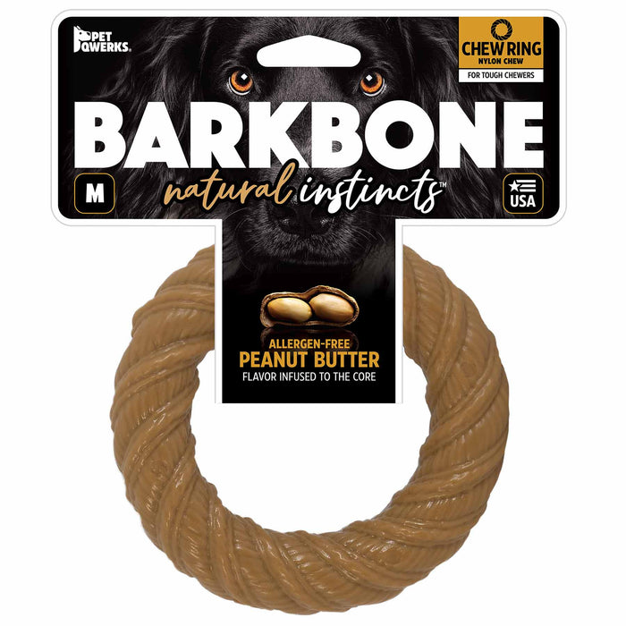 The packaging for BarkBone Natural Instinct Peanut Butter Infused Nylon Chew Ring features allergen-free peanut butter flavor for tough chewers, a dogs face in the background, and is made in the USA. Available in medium size from Barkbone Natural Instincts.