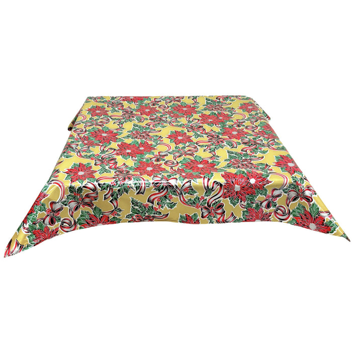 freckled sage christmas ribbons and holly gold oilcloth tablecloth with a simple hem