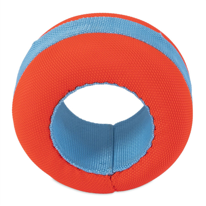 The Chuckit! Amphibious Roller by Chuckit! is a cylindrical floating dog toy with a blue center, red textured fabric edges, and an open hollow middle—ideal for water play and fetch.