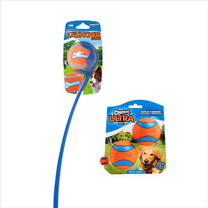 The Chuckit! Classic 26M Launcher with Ultra Ball Medium 3 Pack by Chuckit! includes a blue launcher and orange ball in branded packaging with dog images, perfect for playing fetch with your dog.