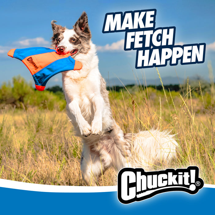 A joyful dog leaps in a grassy field, catching a durable Chuckit! Flying Squirrel toy. The text reads, MAKE FETCH HAPPEN. The Chuckit! logo is displayed at the bottom right corner.