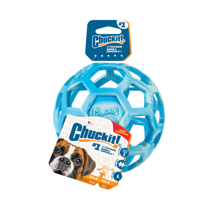 A blue Chuckit! Hol-ee Roller interactive dog toy ball with hexagonal cutouts in packaging that features the Chuckit! logo, a dog image, and promotes this durable fetch toy for fun games with your pet.