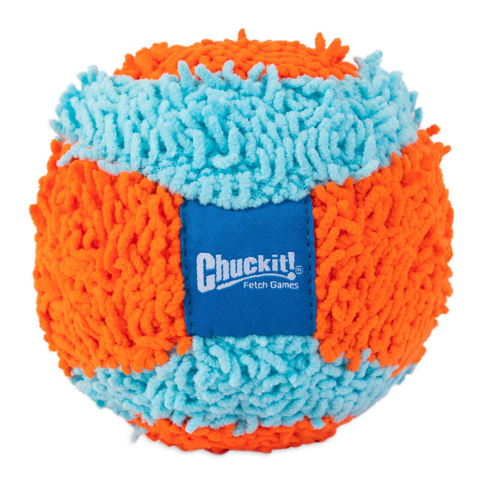 The Chuckit! Indoor Ball by Chuckit! is a textured dog toy with bright orange and light blue shaggy patches, perfect for small dogs’ indoor fetch. It features a soft design and a blue Chuckit! Fetch Games label on the side.