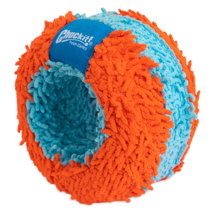 The Chuckit! Indoor Roller Dog Toy features fuzzy blue and orange textured fabric with a branded blue patch, making it a soft and safe choice for indoor fetch.