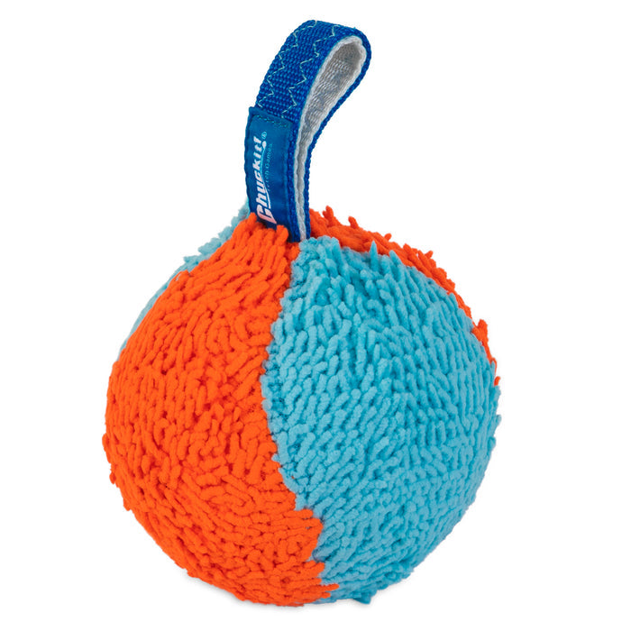The Chuckit! Indoor Shaker by Chuckit! is a spherical dog toy with textured orange and blue sections and a blue fabric handle, ideal for indoor fetch sessions with small dogs.