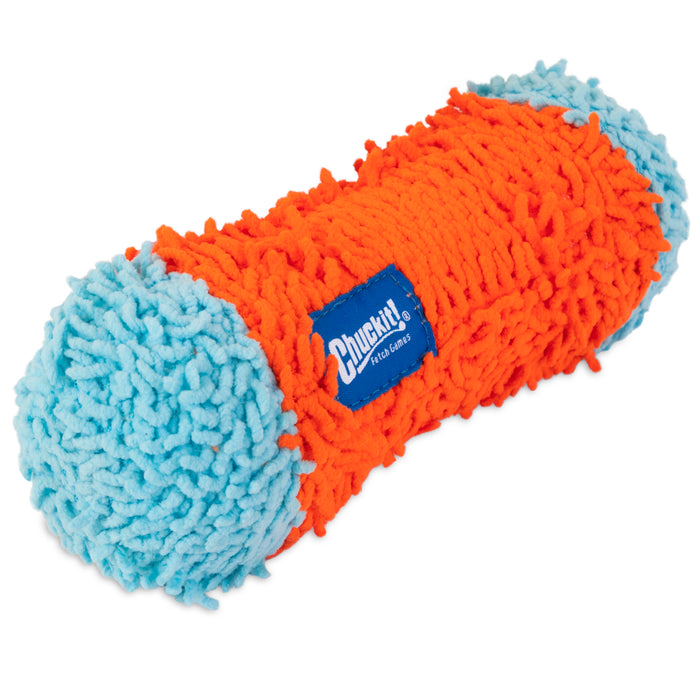 The Chuckit! Indoor Tumble Bumper is an orange and blue cylindrical indoor dog toy with fluffy, noodle-like fabric and Bounceflex Core Technology for safe play, featuring a blue patch labeled Chuckit! FILL GLIDE.