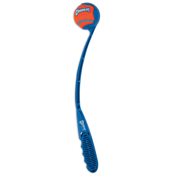 The Chuckit! Junior 18M Dog Ball Launcher by Chuckit! is a blue plastic thrower with a handle and curved arm, featuring hands-free pickup and holding an orange and green tennis ball with the Chuckit! logo.