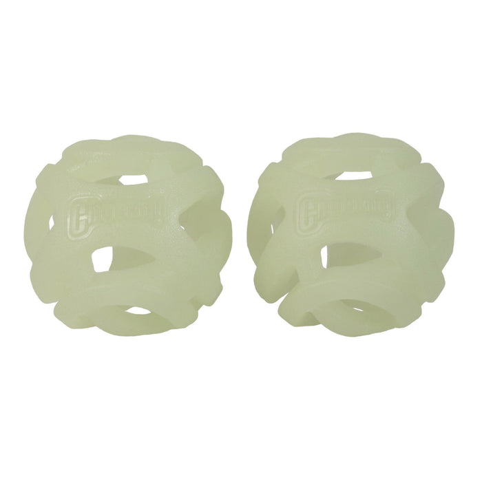 Two pale, translucent Chuckit! Max Glow Air Fetch Balls with an open lattice design sit side by side on a white background, showing the perfect breathable dog toy from Chuckit!.