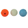 Three Chuckit! Medium Fetch Medley Dog Balls are side by side: an orange ball with a hole and logo, a plain white glow-in-the-dark ball, and a blue ball with orange speckles.