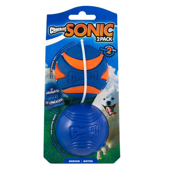 The Chuckit! Sonic Fetch Pack by Chuckit! includes two medium balls—one blue with orange stripes and one solid blue—with a white dog in grass on the package. Text highlights the squeak and crackle sounds.