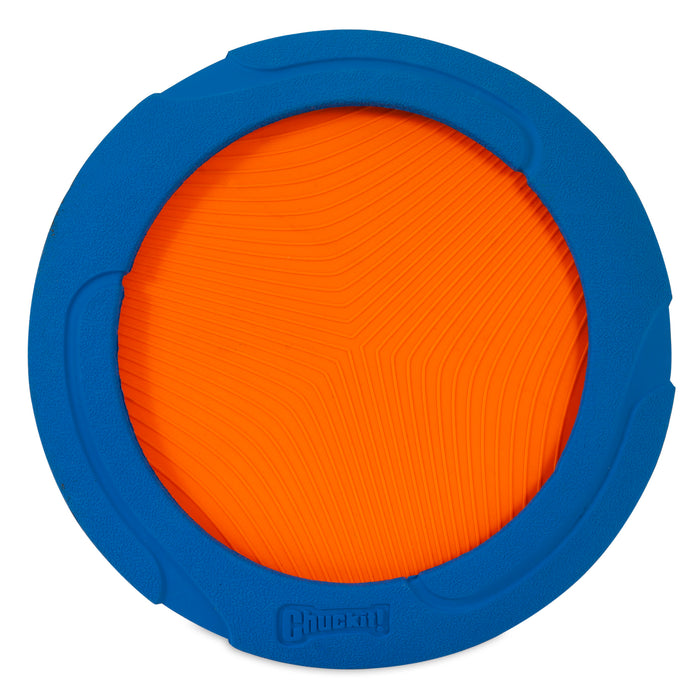 The Chuckit! Ultra Flight is a round dog fetch toy with a textured bright orange center and thick blue rubber rim embossed with the Chuckit! name, offering durability and fun for active pups.