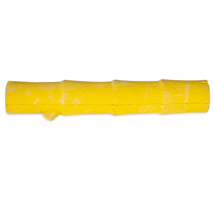 The JW Pet JW Bamboo Stick is a durable, yellow rubber dog toy with a glossy bamboo-like segmented design, ideal for treat stuffing and shown on a white background.