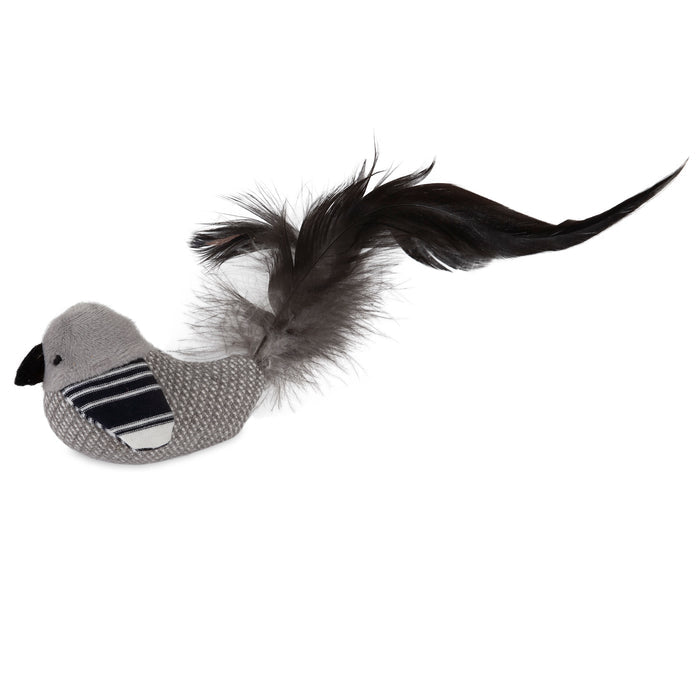 The JW Pet JW Cataction Black And White Bird Toy features a plush gray body, black bead eyes, a striped wing, and a fluffy black feather tail—perfect for cats who love playful catnip toys.