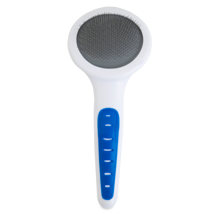 The JW Gripsoft Slicker Brush for Cats by JW Pet features a white handle with a blue rubber grip and a round head with fine metal bristles—perfect for grooming cats and removing shedding hair.