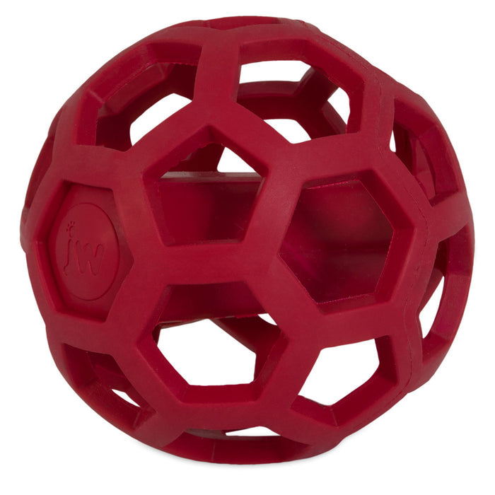 The JW Hol-ee Giggler Dog Toy by JW Pet features a durable red rubber design with a geometric lattice resembling a soccer ball, making it an ideal interactive toy for dogs.