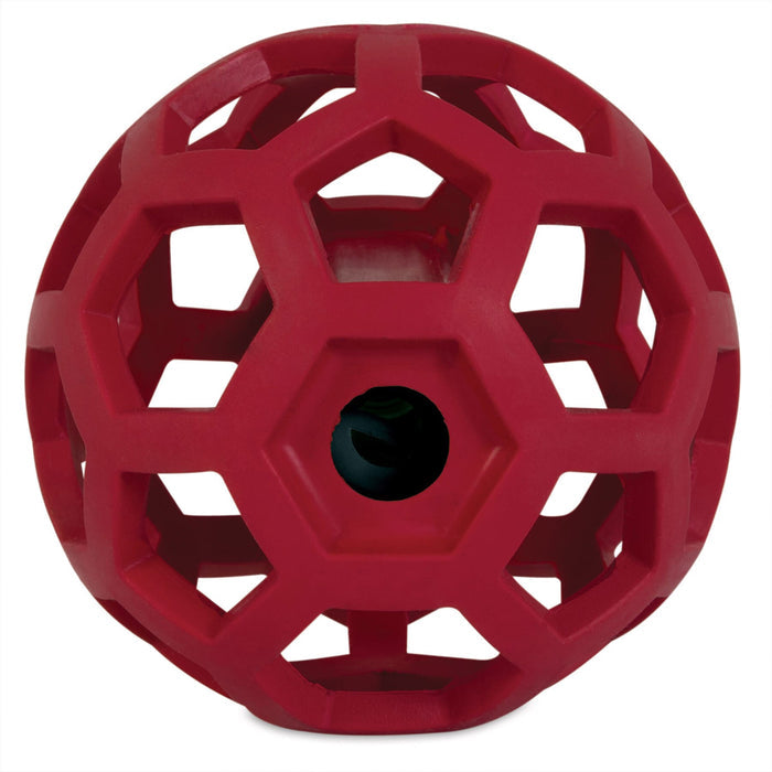 The JW Hol-ee Giggler Dog Toy by JW Pet is a durable, red rubber ball with hollow hexagon and pentagon shapes, making it perfect for interactive play with your dog.