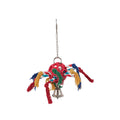 The JW Pet JW Hol-ee Roller Pinata Bird Toy hangs from a metal chain, with interwoven colorful plastic pieces, knotted ropes in red, yellow, green, and blue, and a metallic bell—ideal as a foraging toy for birds.