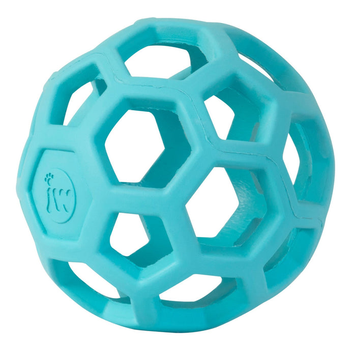 The JW Pet JW Hol-EE Roller Trend-EE is a light blue rubber ball with a hollow, hexagonal honeycomb design—ideal as a dog puzzle toy for mental stimulation.