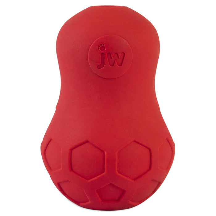 The JW Tumble Teez Dog Toy by JW Pet is a red, durable rubber peanut-shaped toy with hexagon patterns and embossed "jw" and paw print, designed as a fun puzzle to keep your dog engaged.