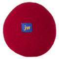The JW Pet Wool-ee Ball is a red, oval eco-friendly dog toy made from natural wool, featuring a small blue patch with yellow "jw" letters at the center, shown against a white background.