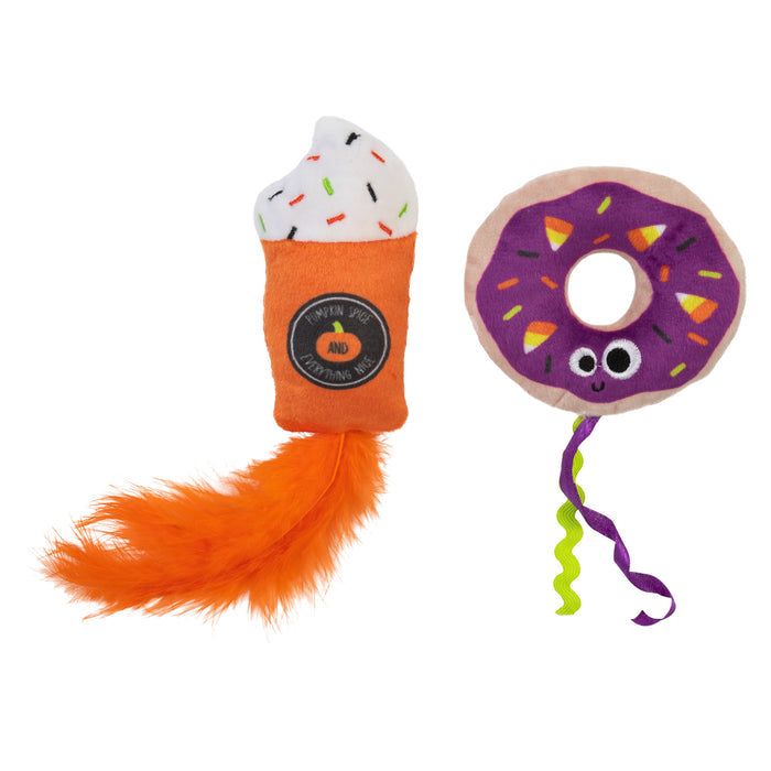 The Mad Cat Festive Fall Treat Plush Cat Toy set includes two Silvernip-infused items: a plush ice cream cone with an orange furry tail and sprinkles, and a purple donut featuring eyes, smiley face icing, sprinkles, and green-purple ribbons.