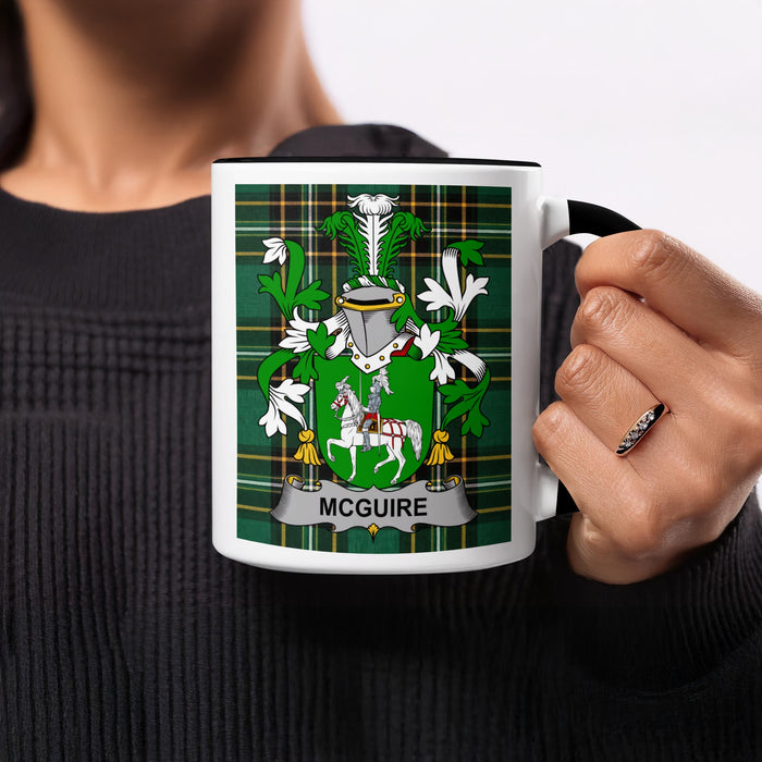 McGuire Irish family crest tartan mug held in hand