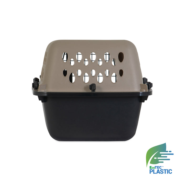The Petmate All Purpose Kennel - Vari is a two-tone pet carrier with a tan ventilated top and black base, shown from the front. The EcoTEC Plastic logo appears in the bottom right. Meets air travel standards similar to the original Vari Kennel.