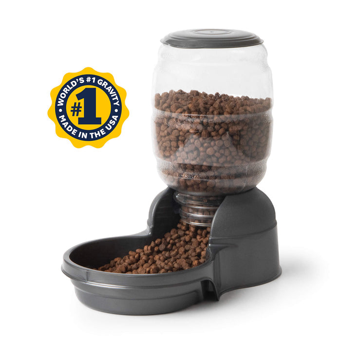 The Petmate Replendish Pet Feeder With Microban features a clear plastic top, a black base filled with brown kibble, antimicrobial protection, and a label stating "World's #1 Gravity Feeder, Made in the USA.