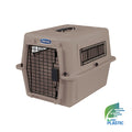 The Petmate Traveler - Ultra Vari Kennel is a beige plastic pet carrier with a metal wire door, side vents, and the Petmate logo on top; an EcoTEC Plastic emblem appears in the bottom right corner.