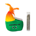 The Quirky Kitty Dumpster Fire Refillable Catnip Toy by Quirky Kitty is a playful green dumpster-shaped toy with flames and “EVERYTHING IS FINE,” paired with a clear tube of dried herbs for your cat's enjoyment.