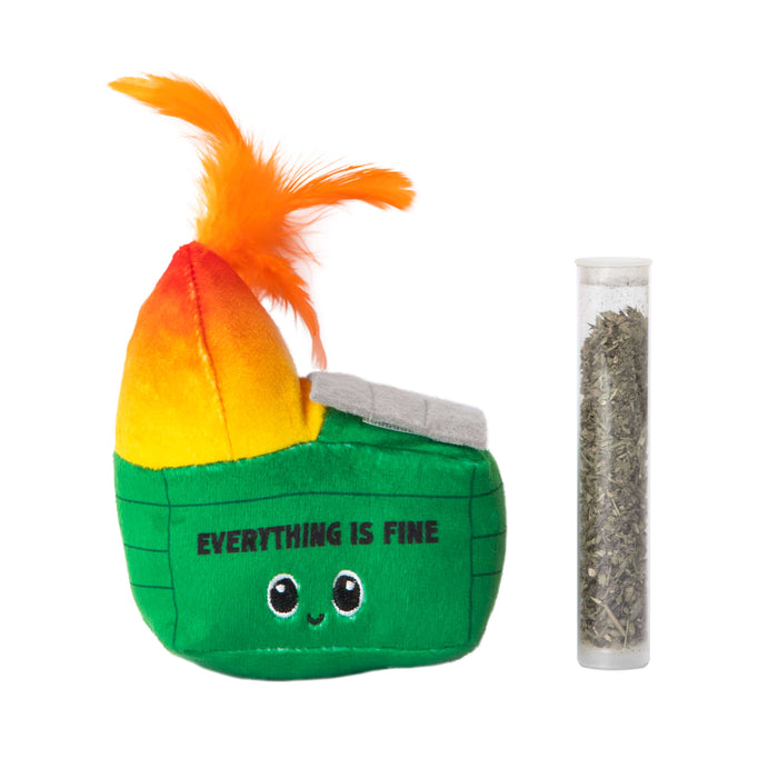The Quirky Kitty Dumpster Fire Refillable Catnip Toy by Quirky Kitty is a playful green dumpster-shaped toy with flames and “EVERYTHING IS FINE,” paired with a clear tube of dried herbs for your cat's enjoyment.