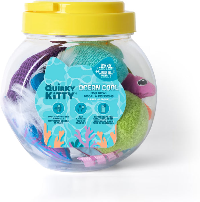A clear plastic jar with a yellow lid holds colorful cat toys. The label reads “Quirky Kitty Fish Bowl 8pk” by Quirky Kitty, featuring illustrations of fish and ocean plants on a blue background.