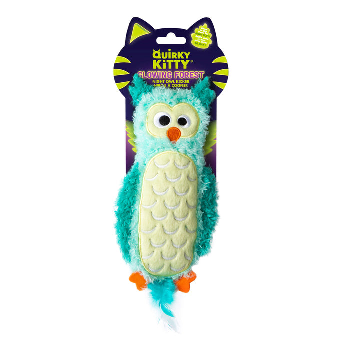 The Quirky Kitty Night Owl Kicker is a turquoise and yellow glow-in-the-dark plush cat toy with large embroidered eyes, orange beak and feet, a fluffy white tail, and fun cat-ear-shaped packaging. Catnip & silvervine included.