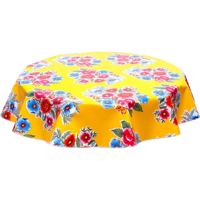 freckled sage round flowers on yellow oilcloth tablecloth