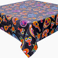 freckled sage skulls on black oilcloth tablecloth with a simple hem