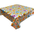 freckled sage skulls on silver oilcloth tablecloth with a simple hem