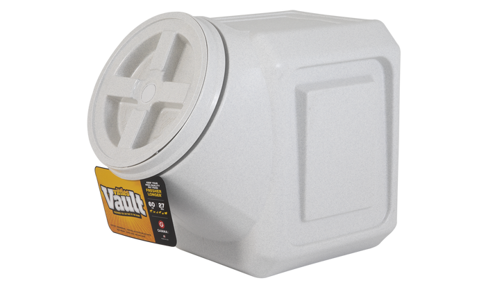 The Vittles Vault Outback Stackable Pet Food Storage Container, by Vittles Vault, is a square white plastic container with rounded edges and a grid lid design featuring Gamma Seal Technology for airtight storage. It holds 60 pounds and is ideal for storing pet food.
